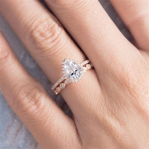Wedding Bands For Pear Shaped Rings Small Single Band Pear Shaped Engagement Ring With Halo