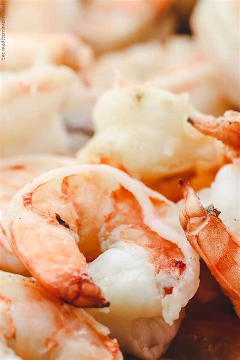 Simmer, covered, until the shrimp are just done, about 2 minutes. Baked Shrimp Stew Recipe | The Mediterranean Dish