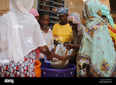 In Ouagadougou Burkina Faso Fulani Women Work Together To Make A