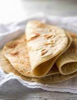 Bake two or three flatbreads at a time for five minutes, or until the flatbreads are puffy and brown spots start to develop. Easy Soft Flatbread Recipe (No Yeast) | RecipeTin Eats