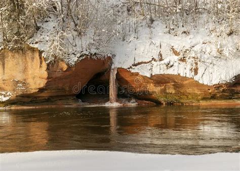 Magical Sunny Winter Day Landscape With Red Sandstone Cliffs That Are