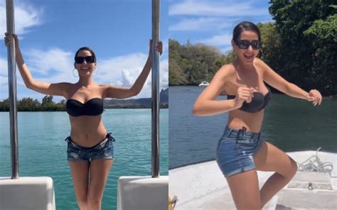 VIRAL Nora Fatehi Shows Off Her Sexy Curves Cleavage In Bikini Top As