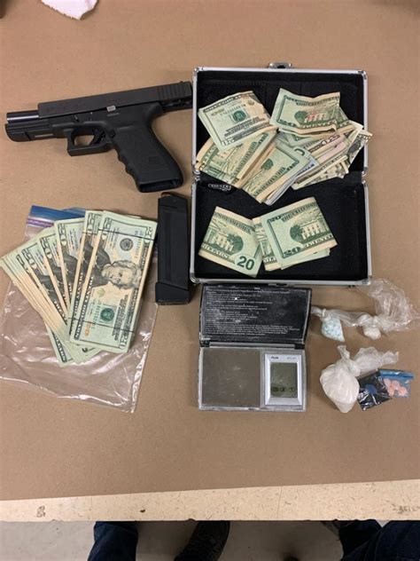 detectives seize drugs guns and cash in west seattle narcotics and money laundering