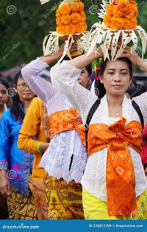 Indonesian With Javanese Traditional Cloth On Tumpeng Agung Umpak Bale
