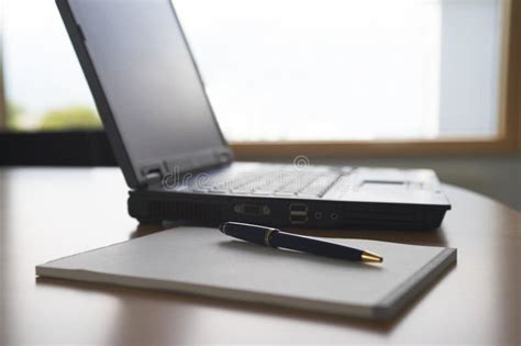 Notepad With Pen And Laptop Stock Image Image Of Business Selective