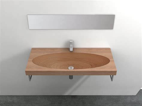 Can a wooden sink be the most suitable solution for our bathroom? Natural Wood Sink - Stan by Plavisdesign | DigsDigs