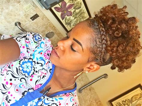 For instance, you might do french braids down the side of your head, looping it around for an elegant braid. High Puff On Short Natural Hair With French Braid