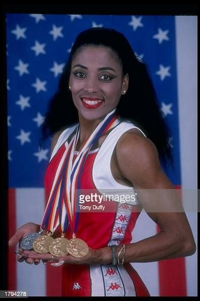 Florence Griffith Joyner Poses For A Picture With Her Medal Won At News Photo Getty Images