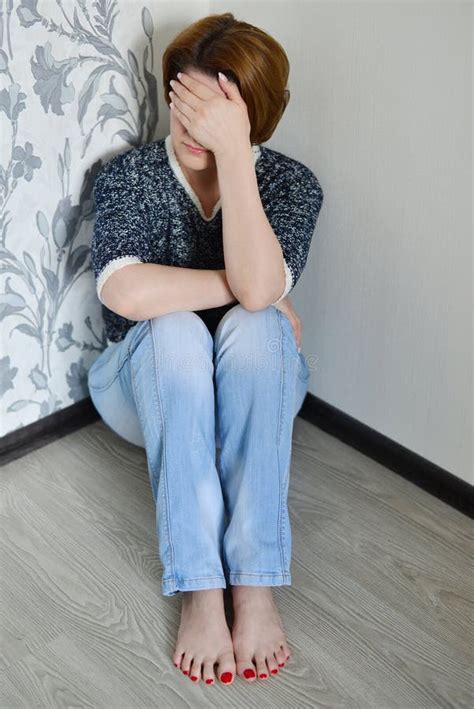 Woman With Depression Sitting In The Corner Of Room Stock Photo Image Of Pharmaceutical