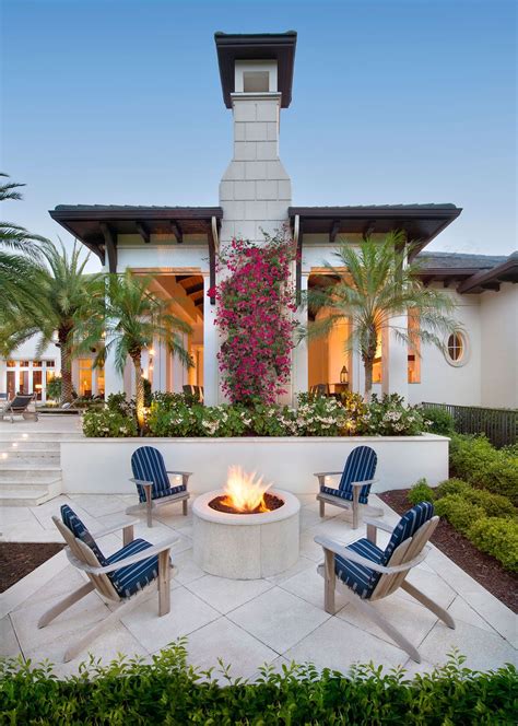 A Beautiful Mediterranean Inspired Outdoor Patio With A White Outdoor