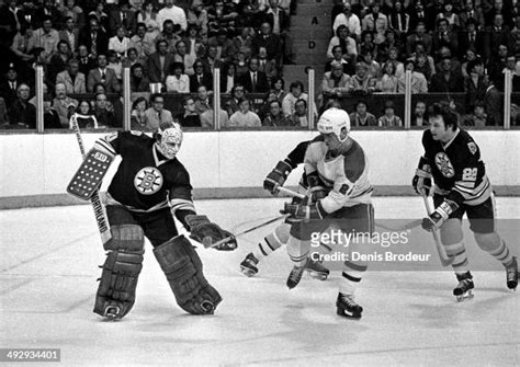Gerry Cheevers Of The Boston Bruins Makes A Glove Save During A Game