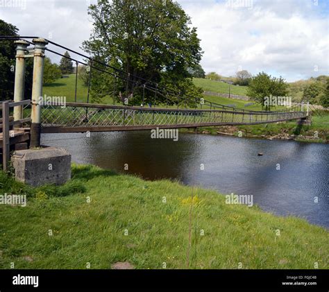 Footbridge Over The River Wharfe On The Dalesway Near Grassington And