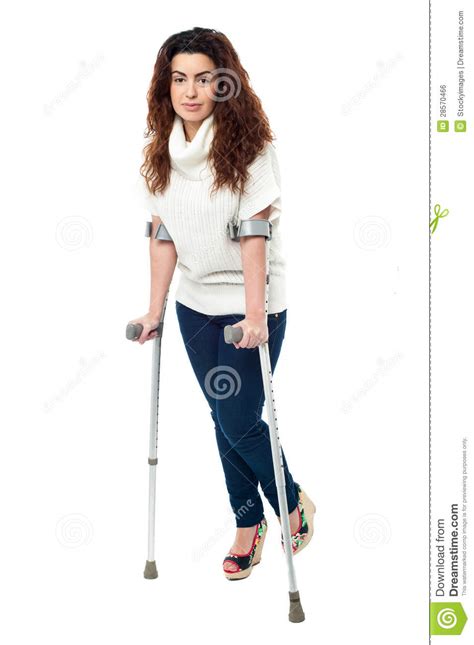 Sad Faced Woman Limping With Crutches Stock Photo Image