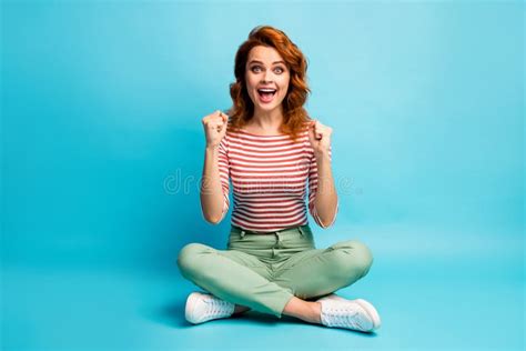Full Length Photo Of Excited Woman Sit Legs Crossed Celebrate Her