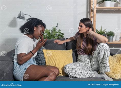 Two Young College Lesbian Homosexual Couple In Relationship Women Argue In Their Home About