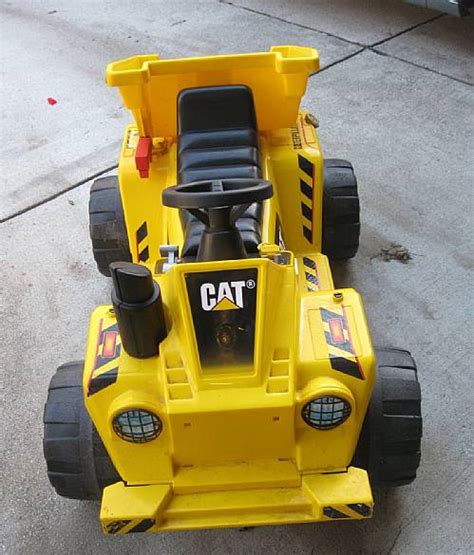 Power Wheels Caterpillar Cat Dump Truck Includes Battery Charger