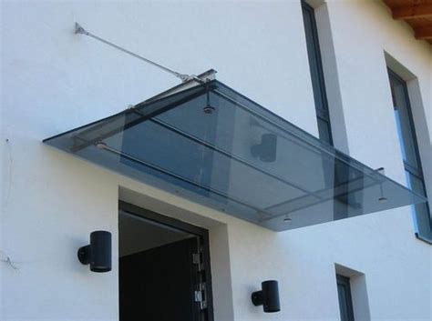 Isolation phonique exceptionnelle pour cette porte d'entrée éligible aux subventions dans les zones aéroportuaires pour les habitations situées en zone 3. Auvent d'entrée en verre - pure inox | Auvent, Marquise ...