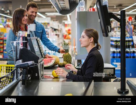 People Buying Goods In A Grocery Store Stock Photo Alamy