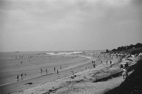 Black And White Photograph Of People At The Beach