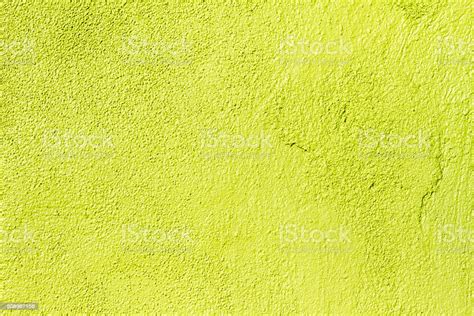 Vibrant Lime Green Stucco Wall Background Texture Stock Photo