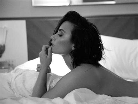 Singer Demi Lovato Drops Her Clothes To Unveil New Single Music