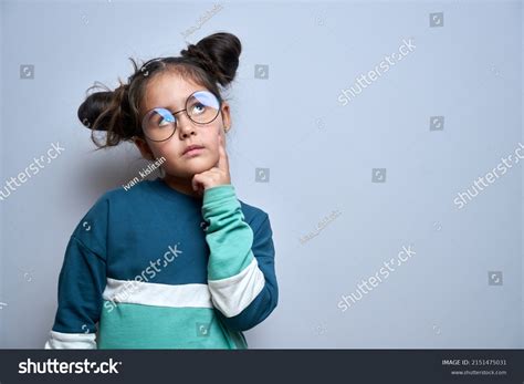 Funny Little Girl Glasses Holding Chin Stock Photo 2151475031