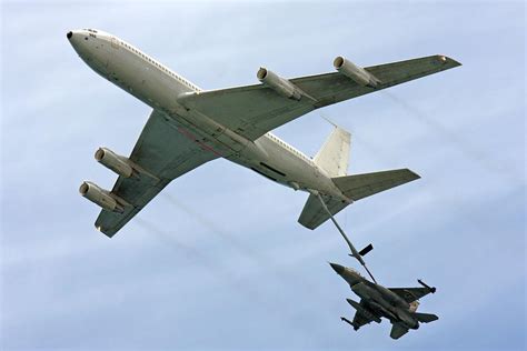 Over 4,600 aircraft have been built since production was approved in 1976. F16 Jet Being Refueled By A Boeing 707 Photograph by ...
