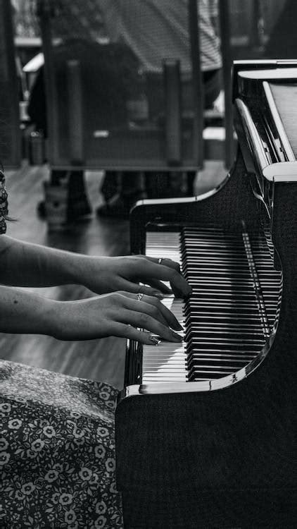 Woman Playing The Piano · Free Stock Photo