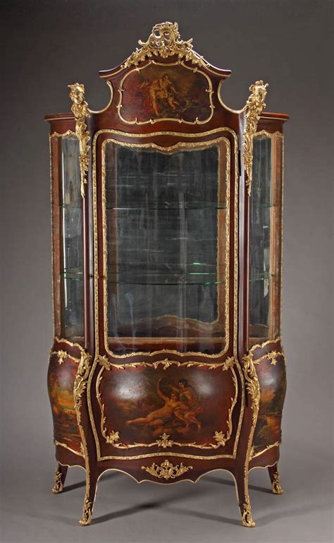 A French Louis Xv Style Ormolu Mounted Mahogany And Vernis Martin