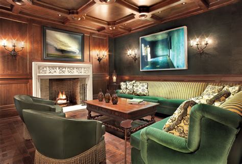 Traditional Brown Living Room with Green Accents - Luxe Interiors + Design