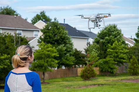 Girl Flying A Drone Drone Videos And Photos Specializing In Real Estate