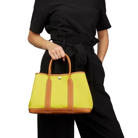Both town leather and country canvas, the garden party gets out into the country in all seasons. 2017 Hermès Lime Canvas and Toffee Negonda Leather Garden ...