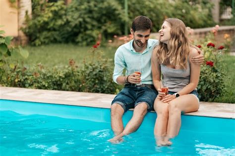 Free Photo Summer Holidays People Romance Dating Concept Couple Drinking Sparkling Wine