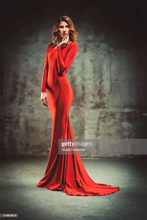 Young Beautiful Woman In Red Dress High Res Stock Photo Getty Images