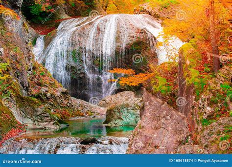 Japanese Hot Springs Onsen Natural Bath Surrounded By Red Yellow Leaves