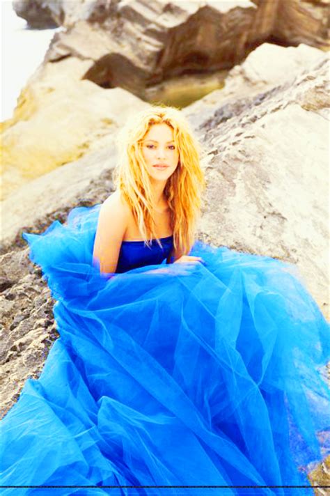 Shakira has a lot of danceable, high energy tracks here. Shakira - Sexy Blue Dress - eueelasfashionistas
