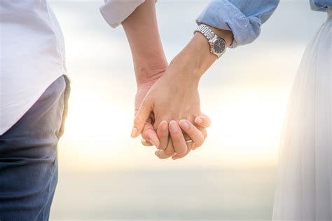 Couple holding hands ~ ThrivePointe Counseling