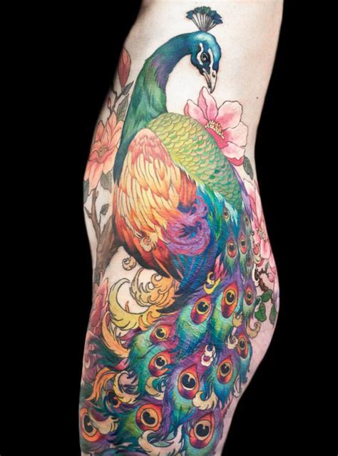 This Amazing Peacock Tattoo Across The Hip And Leg Can Be Hidden Under