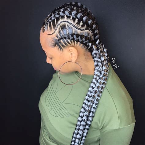 The cornrows are designed into a heart which makes quite the cute little hairstyle. I got the moves🙌🏾 👑 | Beautiful black hair, Cornrow hairstyles, Twist braid hairstyles