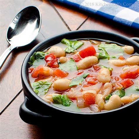 U had me at kitchen recipe alert!!! Kitchen Riffs: Tomato and White Bean Soup with Escarole