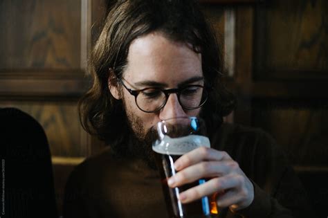 Man Drinking A Pint Of Beer By Stocksy Contributor Cwp Llc Stocksy