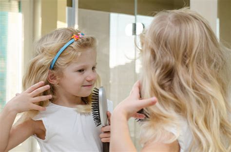 By tim pearce | october 19, 2019 08:55 pm print this article. Blond Girl Brushing Her Hair Stock Photo - Download Image ...