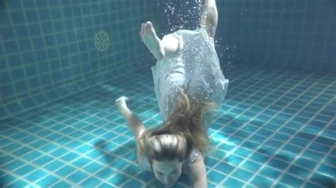 Girl In Bikini Swimming Underwater In Blue Pool Cinematic Slow Motion Video Stock Video