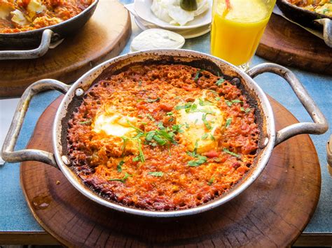 Shakshuka Is A Traditional Israeli Breakfast Dish Made With Tomatoes