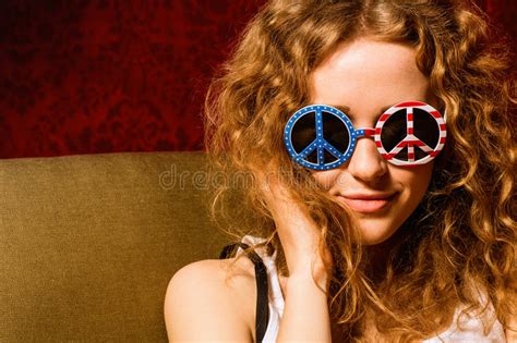 Young Girl With Curly Hair Wearing Sunglasses With The ...