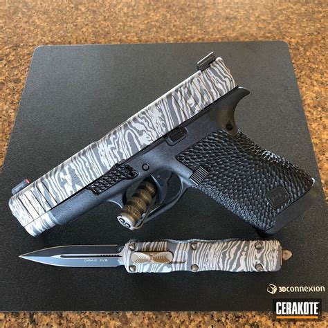 Matching Glock And Otf Knife Coated In Titanium And Cobalt Cerakote