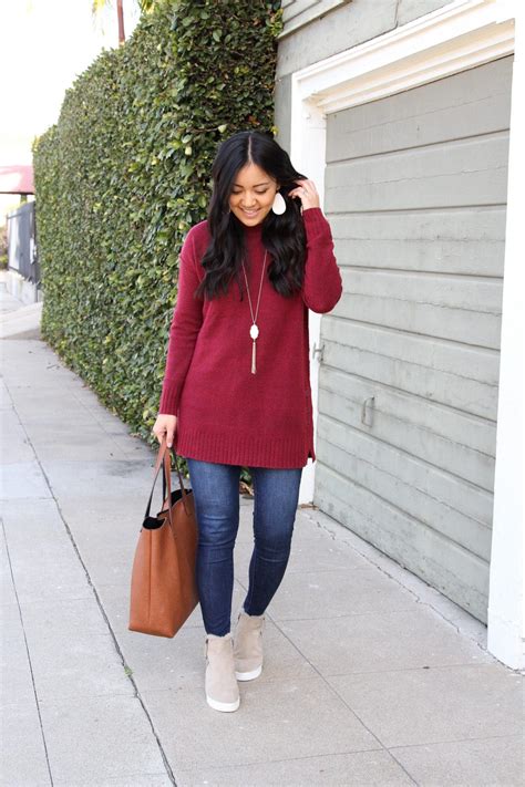 Red Sweater Skinny Jeans Wedge Booties Cognac Tote Outfit 3