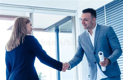 Handshake Between Male And Female Business Man Stock Image Image Of
