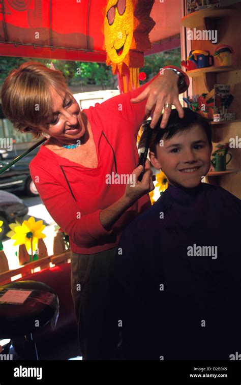 Boy Getting A Haircut Stock Photo Alamy