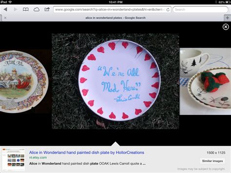 Dollar store plates with alice in wonderland quotes written on them